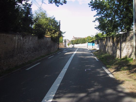 Stone Walls Surround The Road